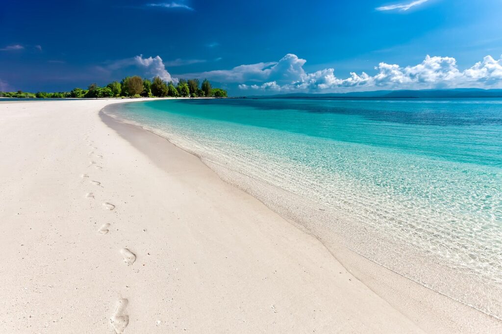 beach, sea, footprints, sand, sandy beach, seashore, nature, shore, coast, coastline, shoreline, tropical island, landscape, tropical, white sand beach, travel, indonesia-6292382.jpg